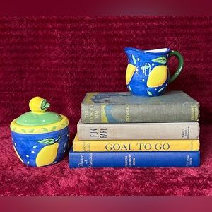 Vintage Stack of Four Old Books for Home Decor: dark blues, yellow, gold, greens